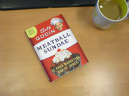 Seth Godin's Meatball Sundae book on my desk at work. Taken with a crappy mobile phone camera